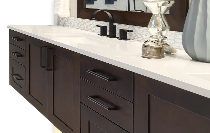 Custom dark wood bathroom vanity cabinetry in Wellesley