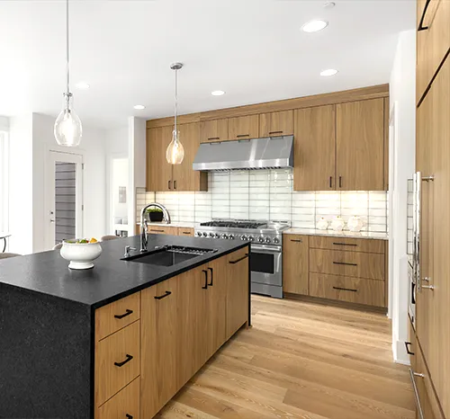 Completed custom wood kitchen cabinetry installation in Greater Boston